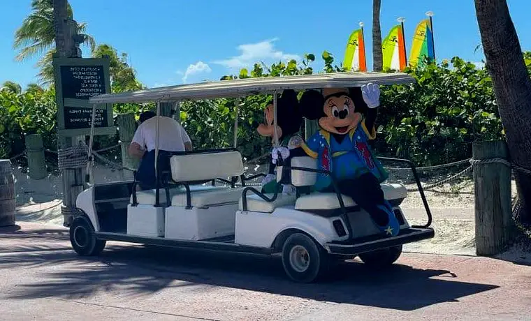 Mickey-Mouse-and-Minnie-Mouse-riding-the-golf-cart
